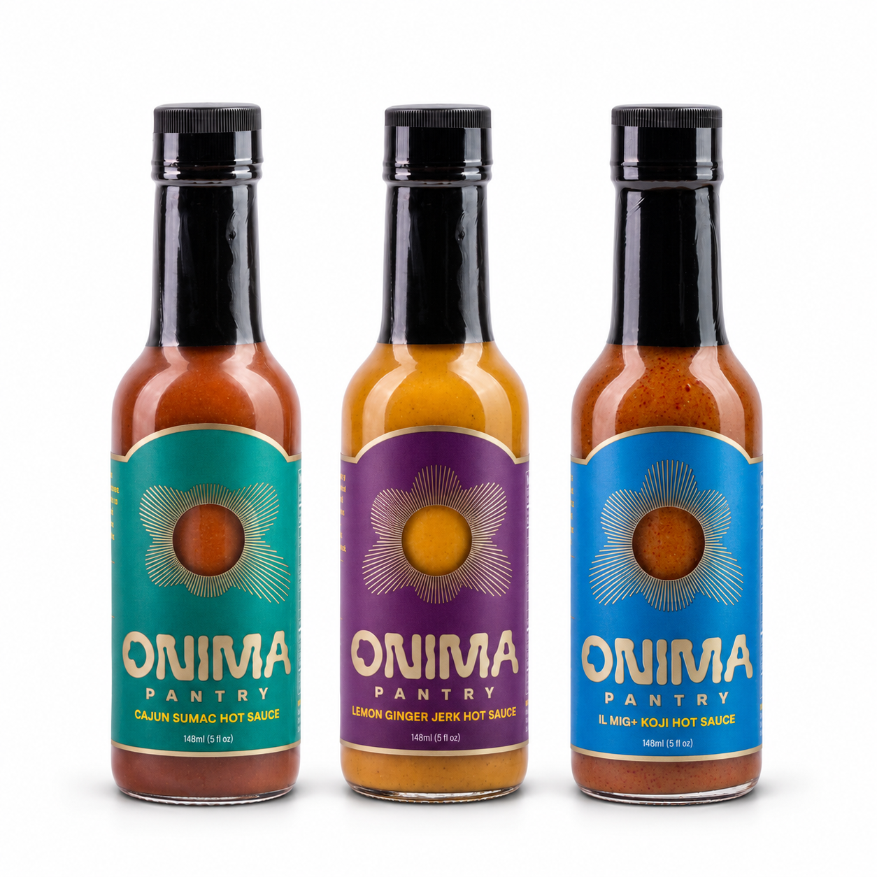 Cooking Trio bundle: one bottle each of Cajun Sumac, Lemon Ginger Jerk, Habanero Koji on a white background. Habanero Koji is pictured in IL MIG+ packaging.