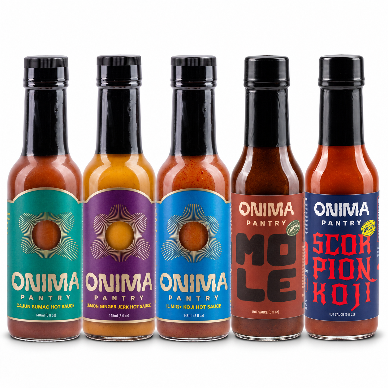 Pantry Five bundle: one bottle each of Cajun Sumac, Lemon Ginger Jerk, Habanero Koji, Mole, Scorpion Koji on a white background. Habanero Koji is pictured in IL MIG+ packaging.